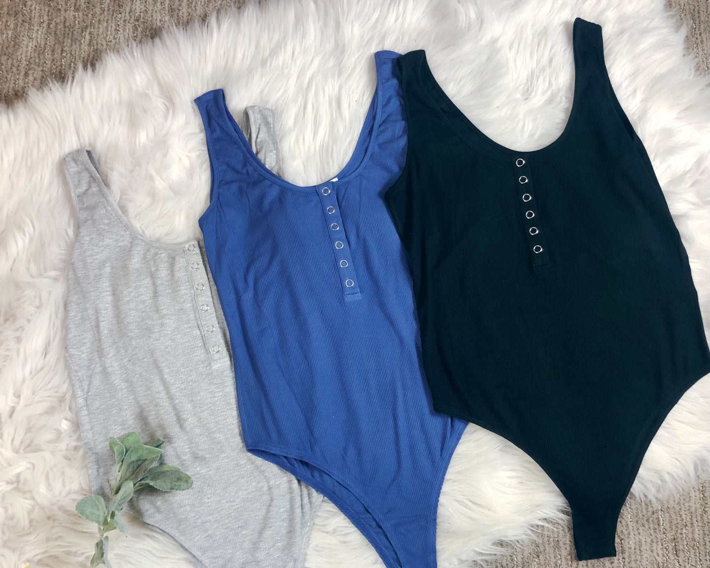 RIBBED SLEEVELESS BODYSUIT
