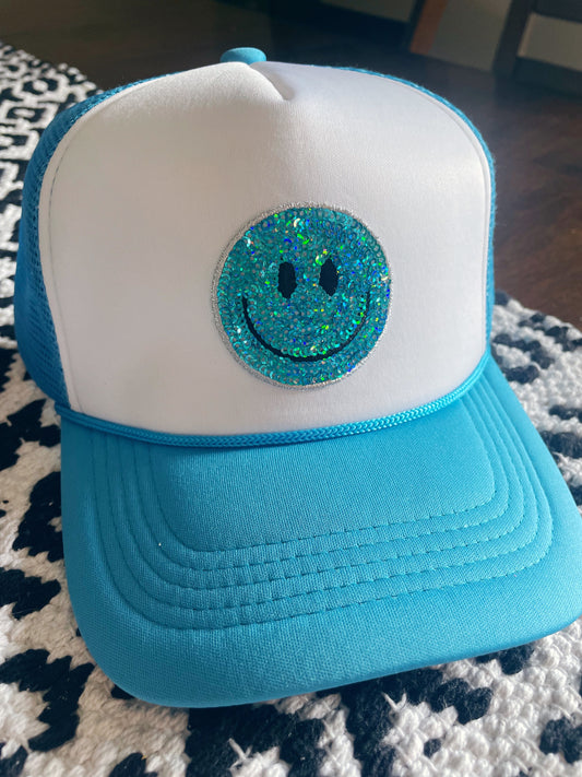 SEQUIN SMILEY TRUCKER HAT
