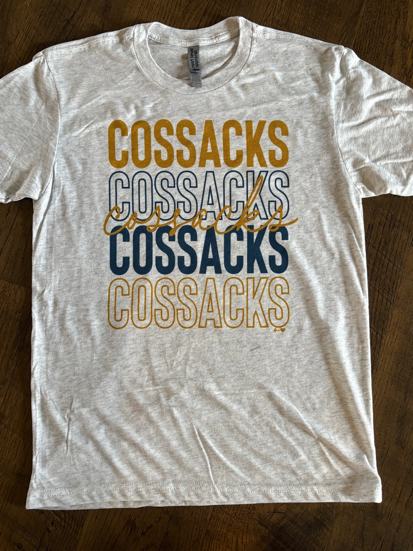 REPEATING OUTLINE COSSACK TEE