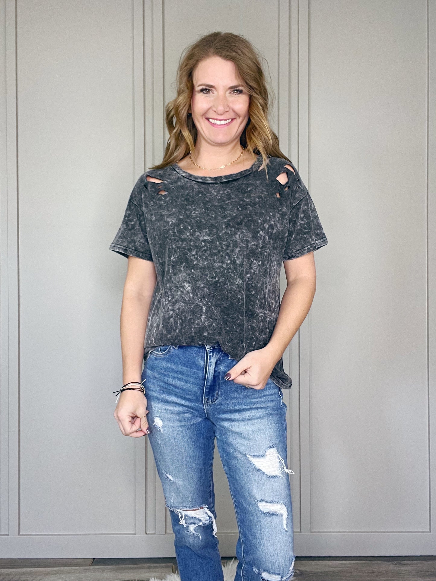 WASHED KNIT TOP WITH LASER CUT DETAILS