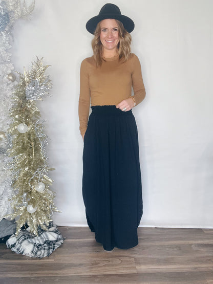 SMOCKED WAIST SIDE SLIT MAXI SKIRT